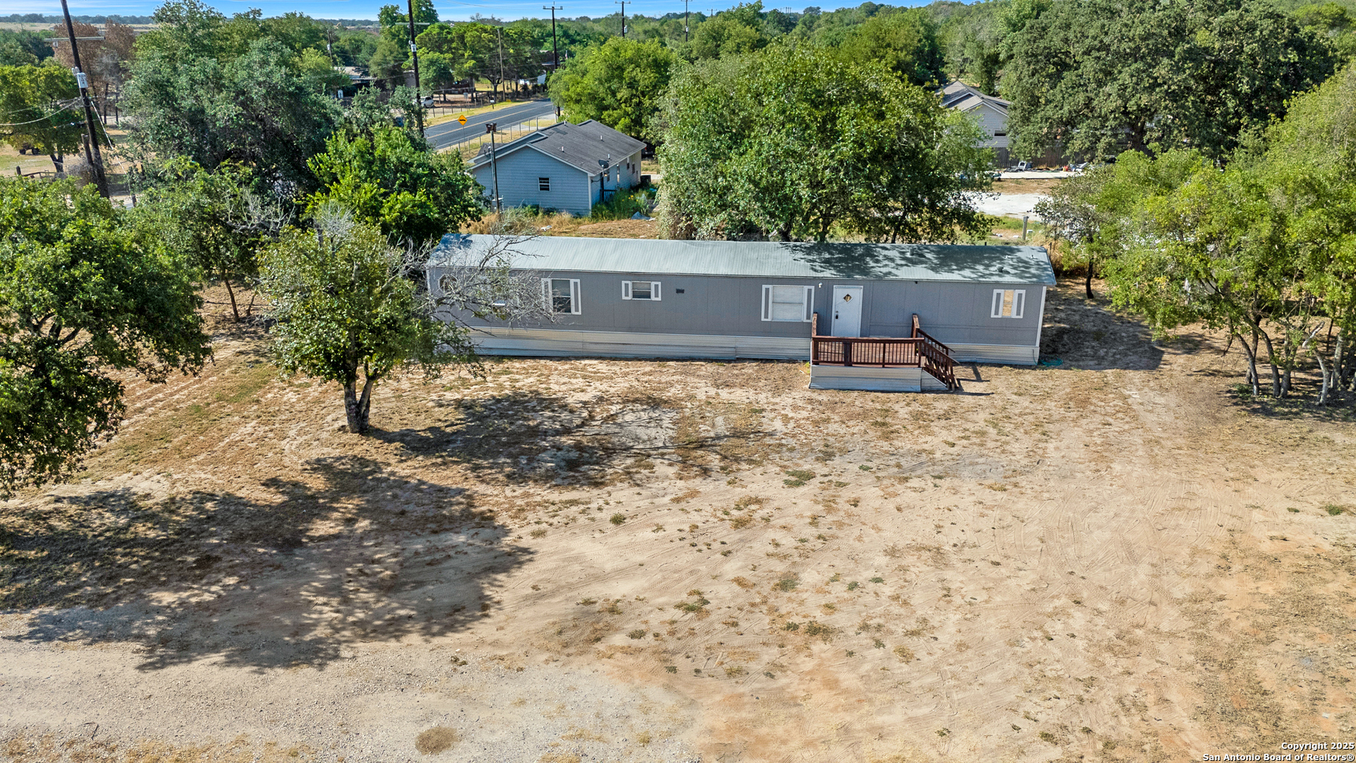 25335 Pleasanton Road San Antonio, TX 78264 - Photo 4 of 26 a view of a yard with a house