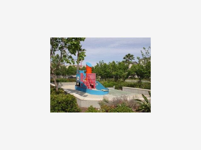 171 Rainbow Place Milpitas, CA 95035 - Photo 9 of 9 a picture of a bench in front of a building