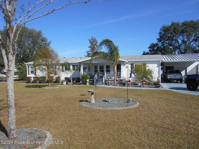 a view of a house with a swimming pool