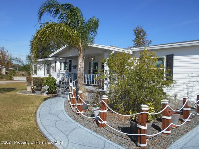 a view of a house with a patio