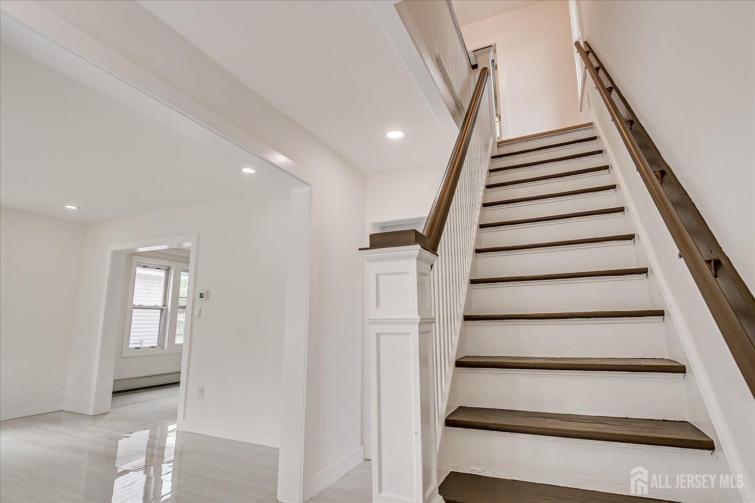37 Summit Avenue Fords, NJ 08863 - Photo 18 of 28 a view of entryway with wooden floor and stairs