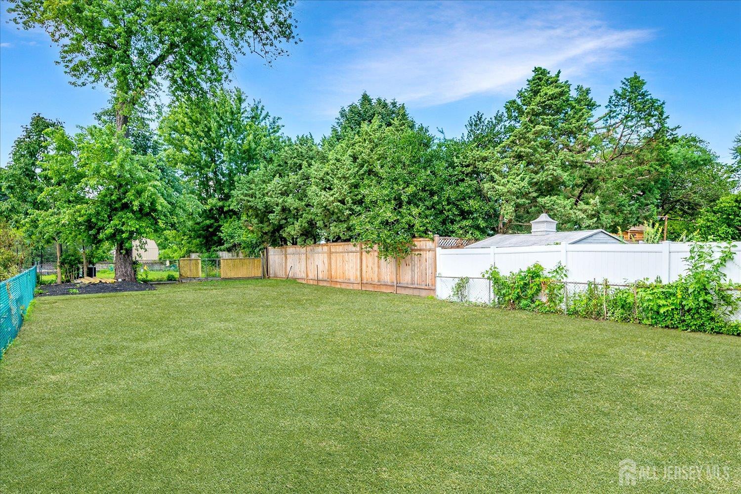 37 Summit Avenue Fords, NJ 08863 - Photo 27 of 28 a view of a yard with a tree