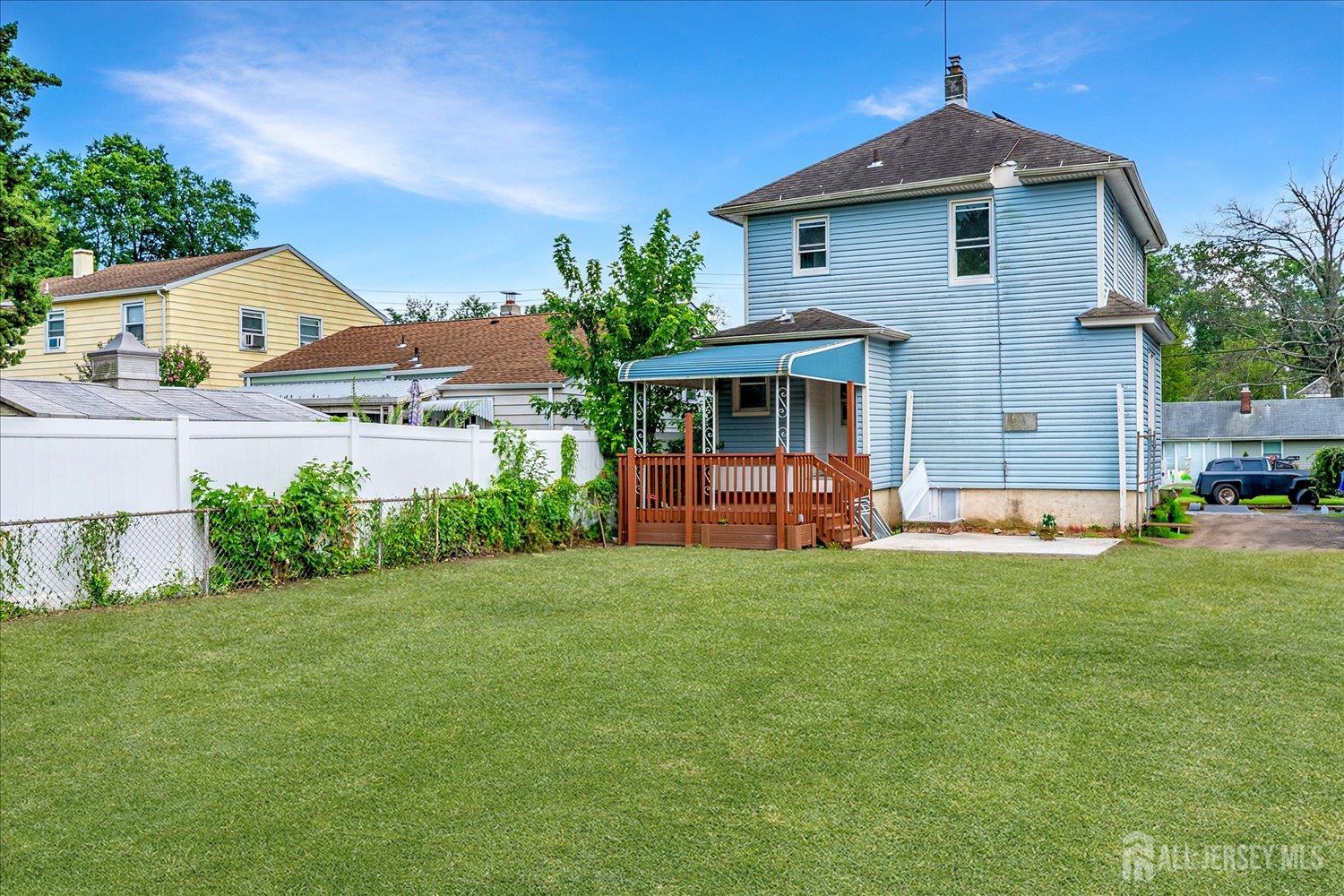 37 Summit Avenue Fords, NJ 08863 - Photo 28 of 28 a front view of a house with a yard and garage
