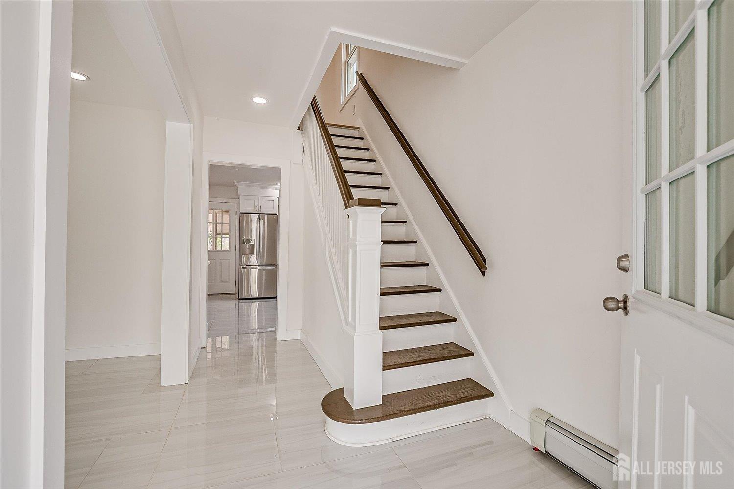 37 Summit Avenue Fords, NJ 08863 - Photo 5 of 28 a view of entryway and hall with wooden floor