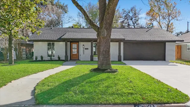 a house view with a garden space