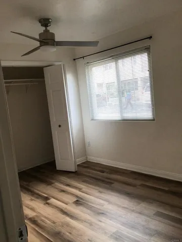 a view of a room that has a window in it