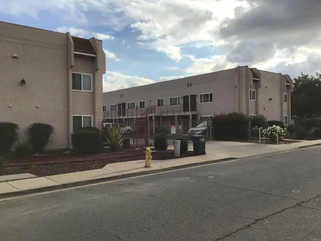 a street view along with residential houses