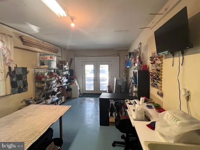 a view of a living room and dining room