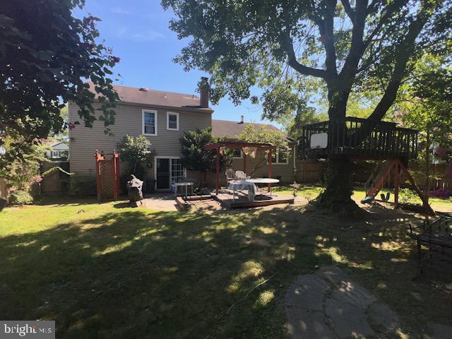 69 Scott Run Circle Bear, DE 19701 - Photo 20 of 21 a view of a house with a yard