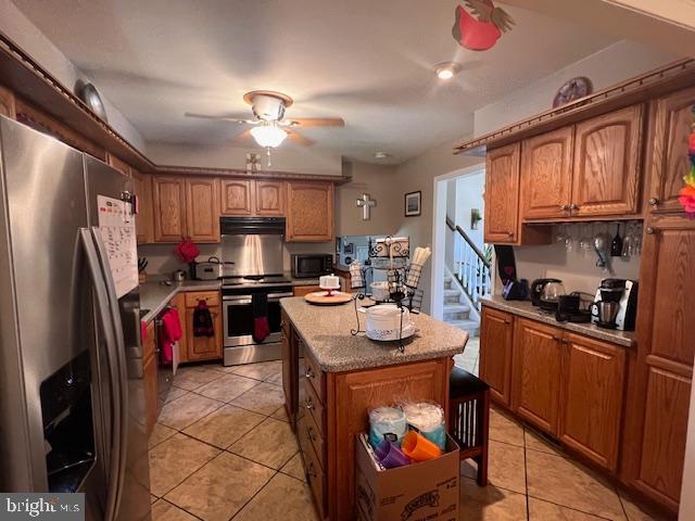 69 Scott Run Circle Bear, DE 19701 - Photo 8 of 21 a kitchen with a refrigerator a sink dishwasher a stove and a refrigerator