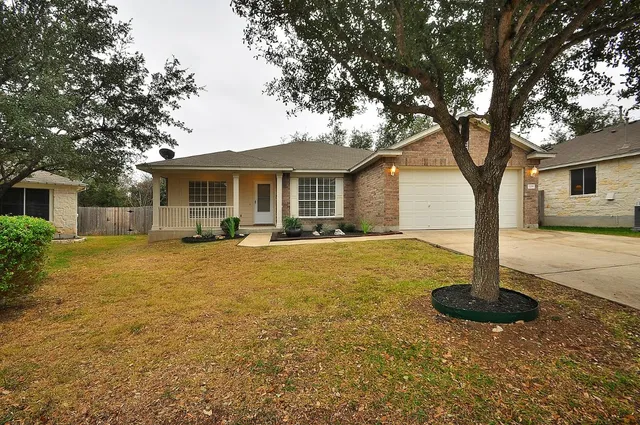 a house with swimming pool in front of it