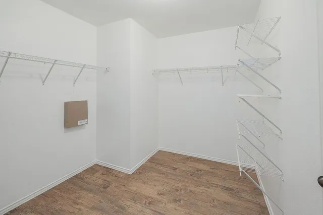 a view of a room with racks on the wall