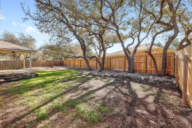 a view of yard with trees