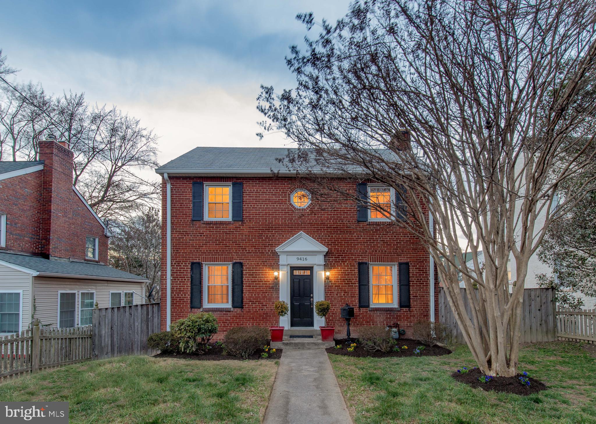 9416 Colesville Road Silver Spring, MD 20901 - Photo 5 of 40 a front view of a house with garden
