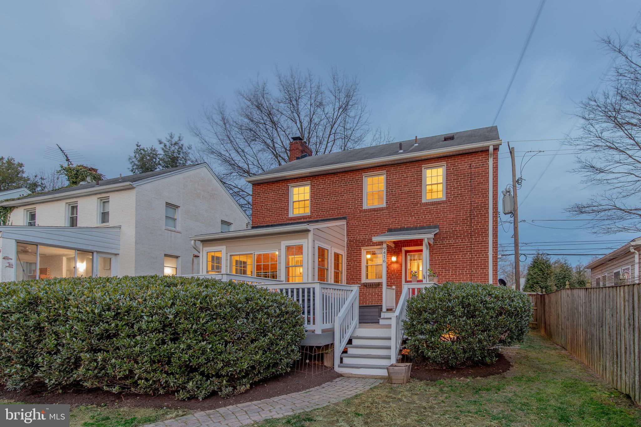 9416 Colesville Road Silver Spring, MD 20901 - Photo 6 of 40 front view of a house with a garden