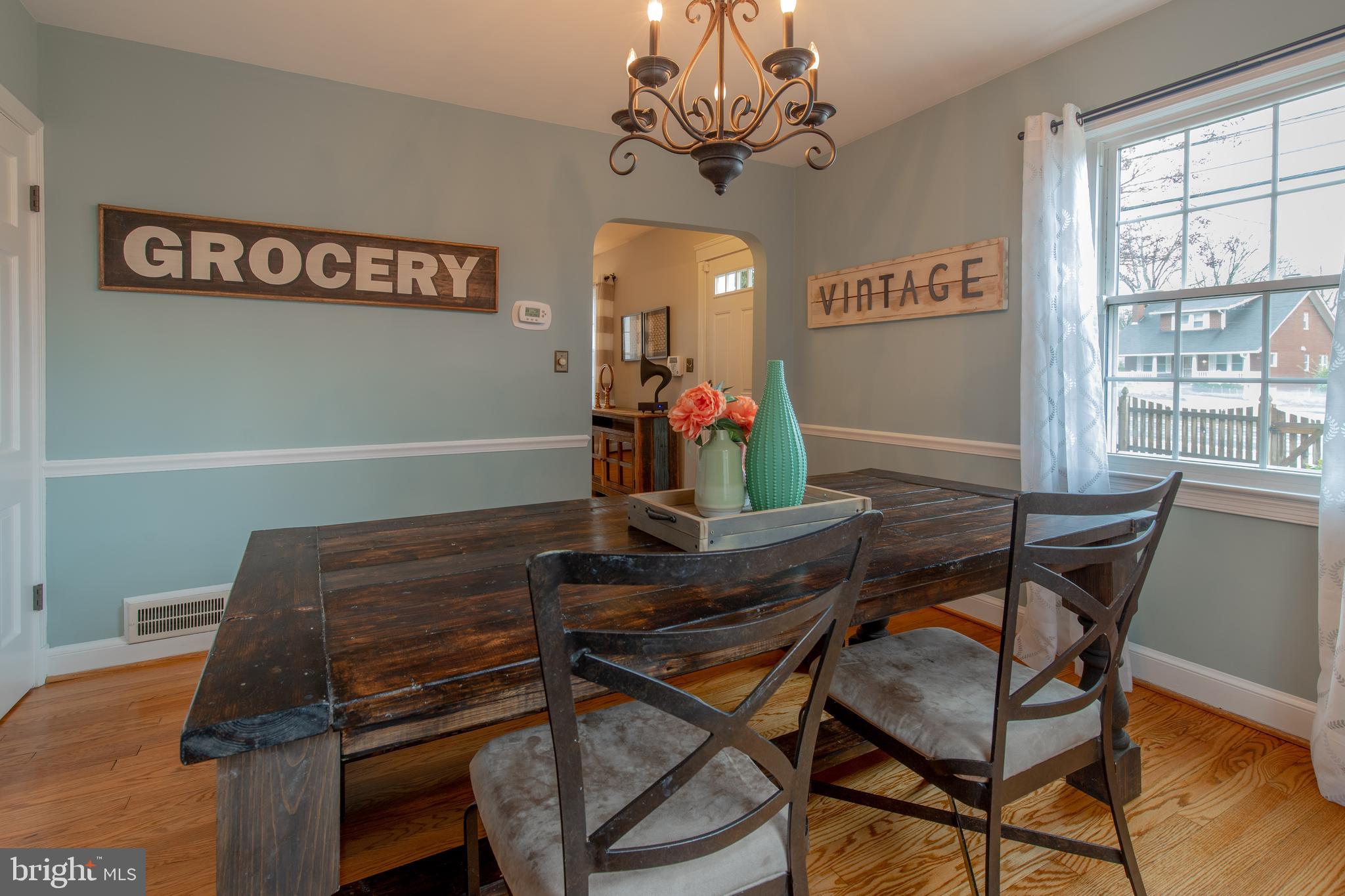 9416 Colesville Road Silver Spring, MD 20901 - Photo 8 of 40 a dining room with furniture and window