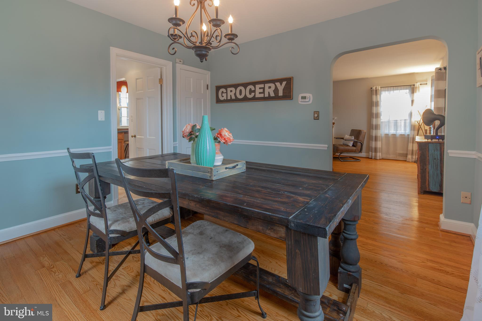 9416 Colesville Road Silver Spring, MD 20901 - Photo 9 of 40 a dining room with furniture and wooden floor