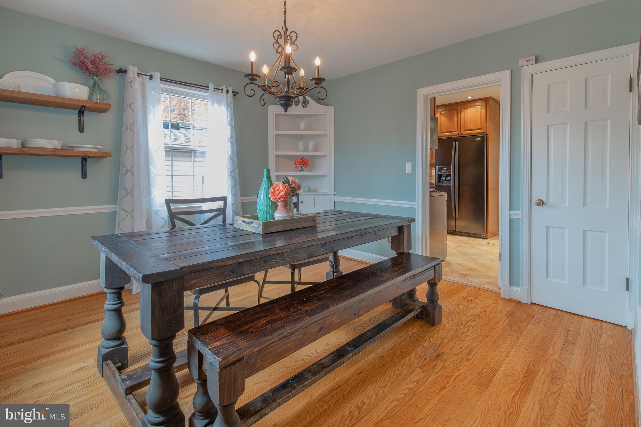 9416 Colesville Road Silver Spring, MD 20901 - Photo 10 of 40 a view of livingroom with furniture and wooden floor