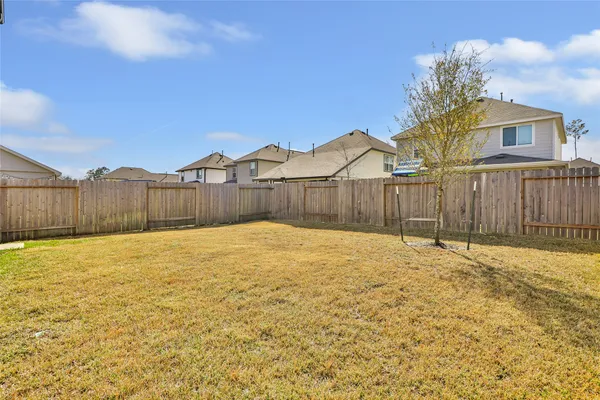 a view of a backyard of a house