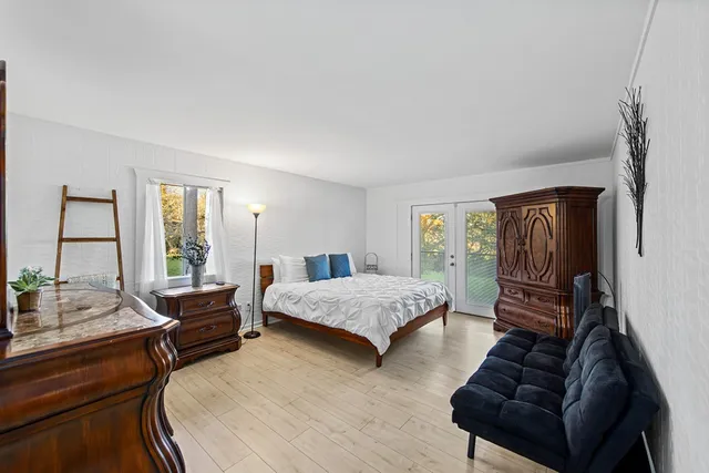 a bathroom with a toilet a sink and a shower