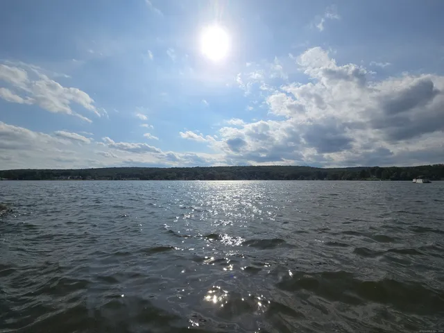 a backyard of a house with seating space