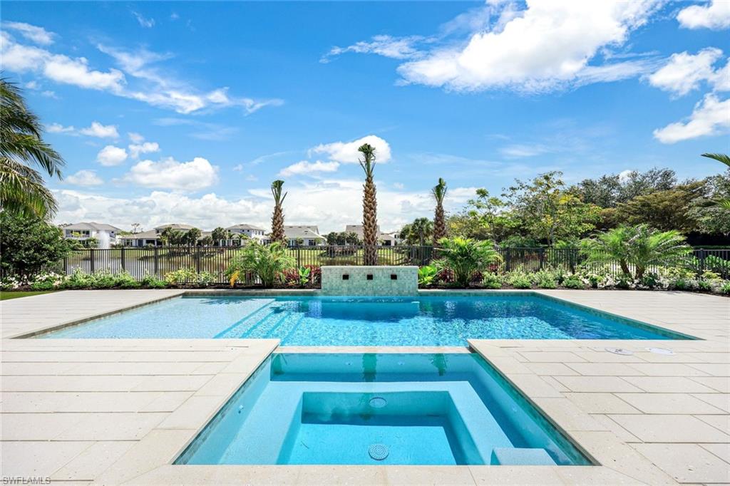 16728 Enclave Circle Naples, FL 34110 - Photo 46 of 50 a view of a tennis court