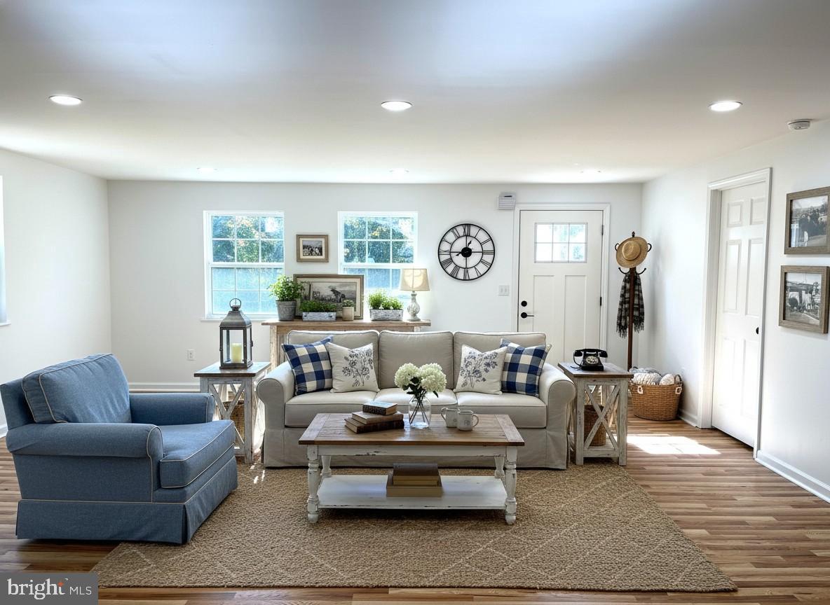 7060 Fredericks Hall Road Mineral, VA 23117 - Photo 3 of 16 a living room with furniture and painting on the wall