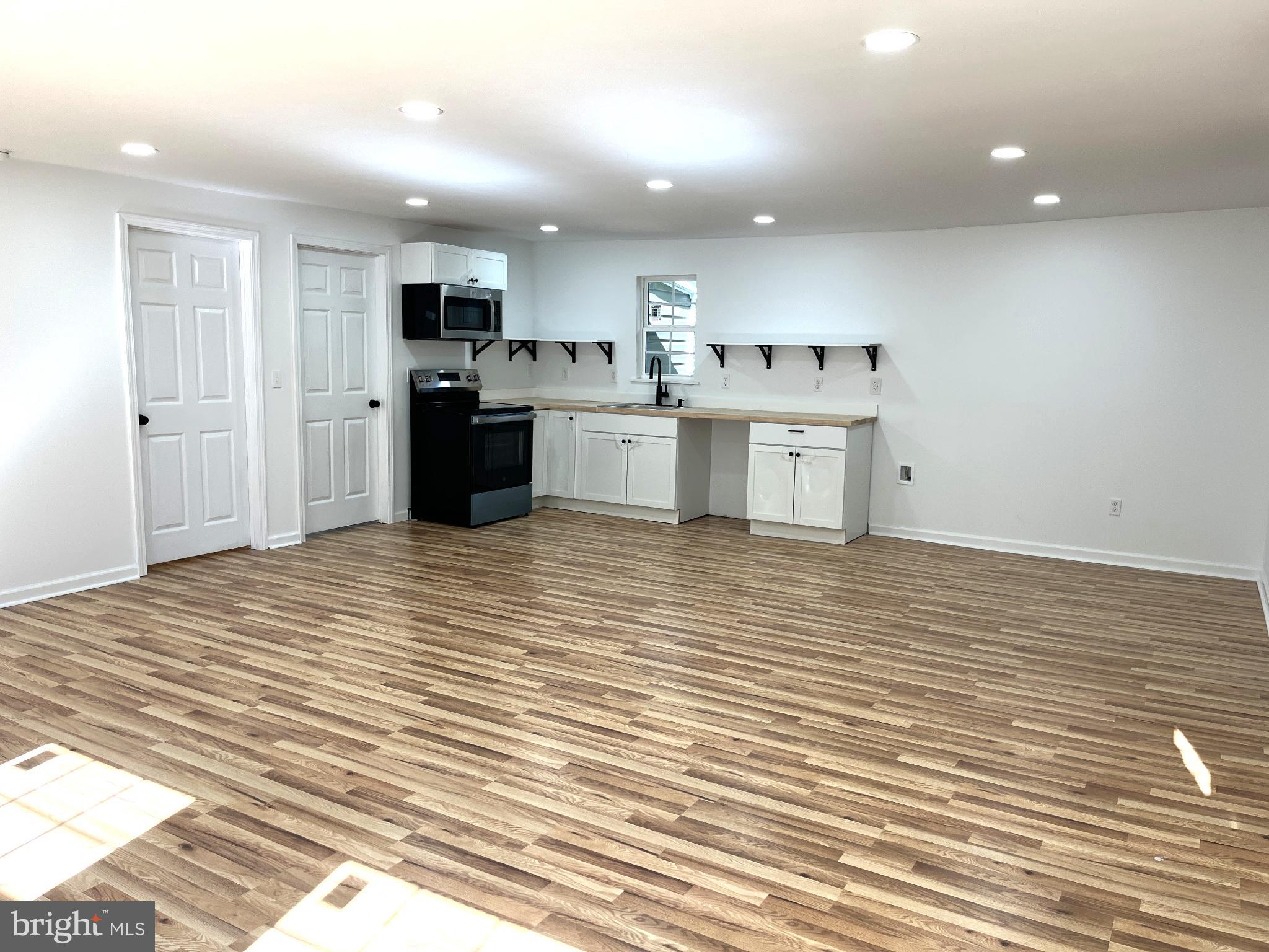 7060 Fredericks Hall Road Mineral, VA 23117 - Photo 7 of 16 a view of kitchen with wooden floor