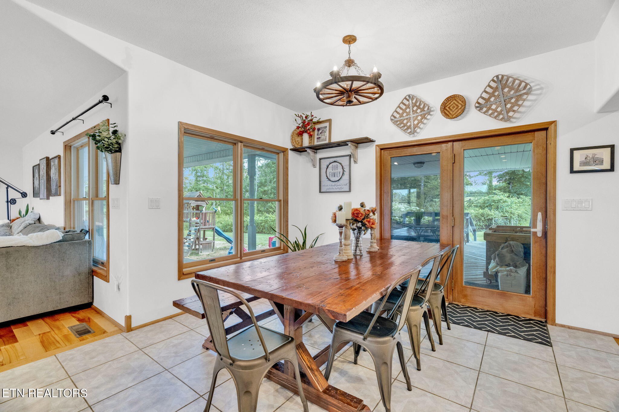 596 Clifty Creek Road Oakdale, TN 37829 - Photo 15 of 60 a view of a dining room and kitchen table and chairs