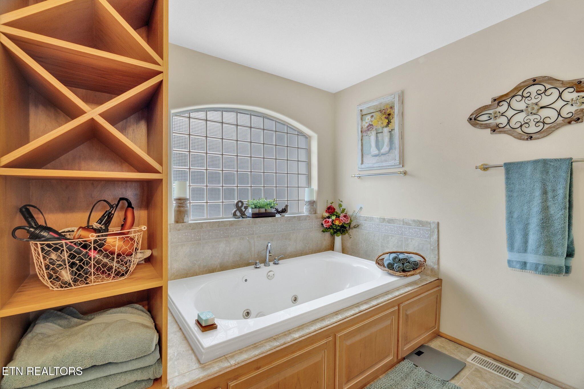 596 Clifty Creek Road Oakdale, TN 37829 - Photo 20 of 60 a bathroom with a tub and a shower