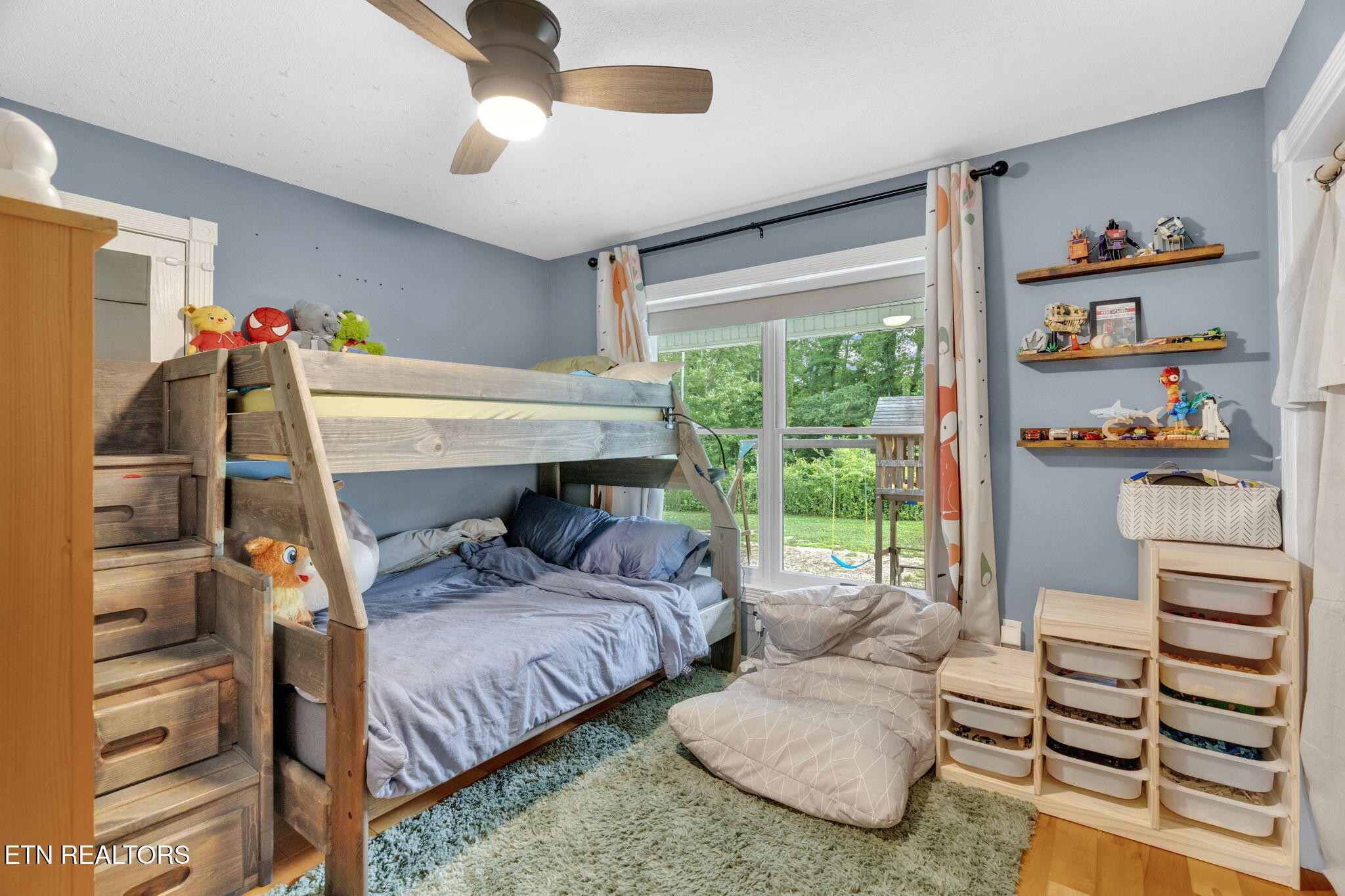 596 Clifty Creek Road Oakdale, TN 37829 - Photo 22 of 60 a bedroom with a bed and a window