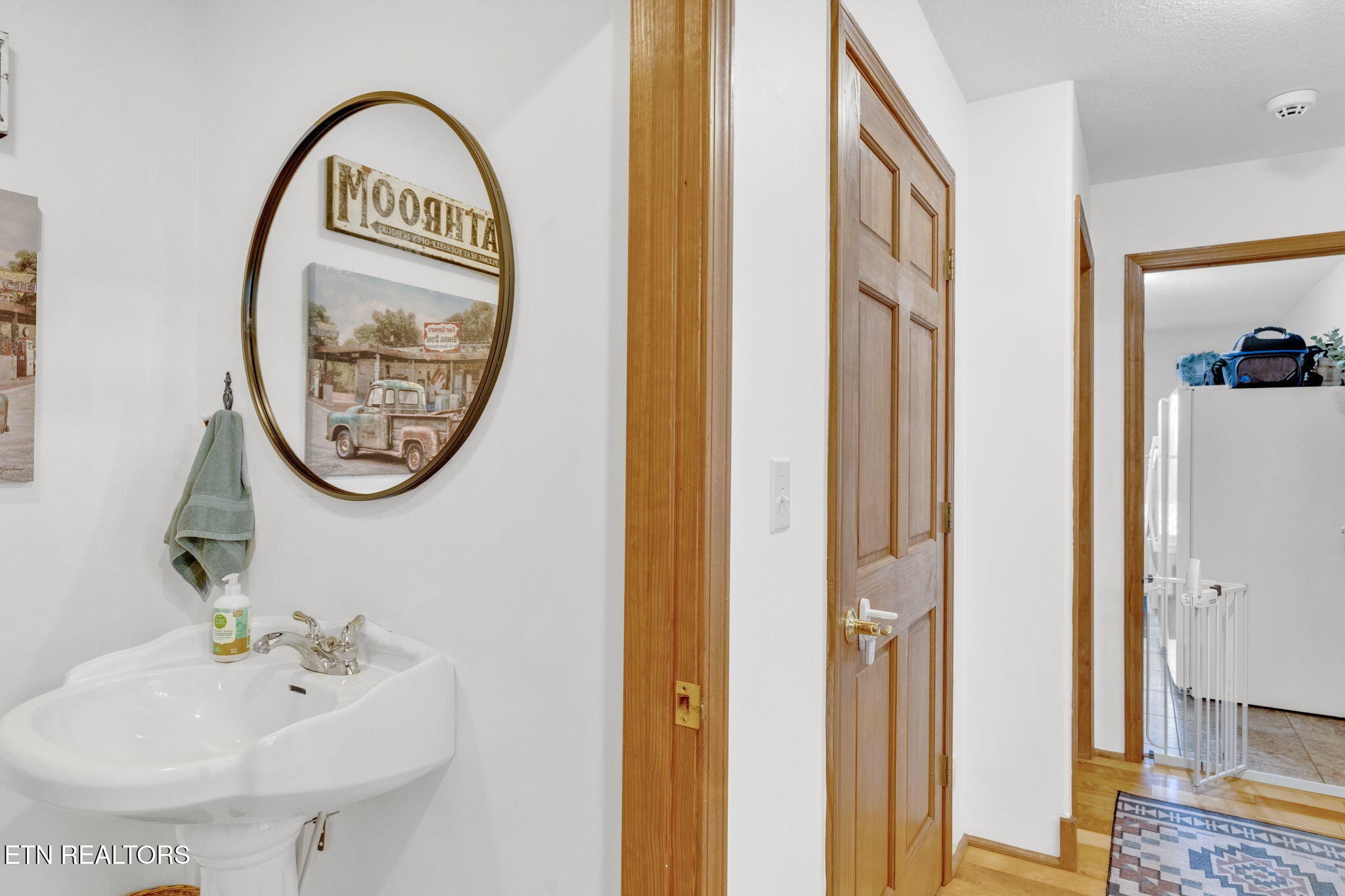 596 Clifty Creek Road Oakdale, TN 37829 - Photo 25 of 60 a bathroom with a sink and a mirror