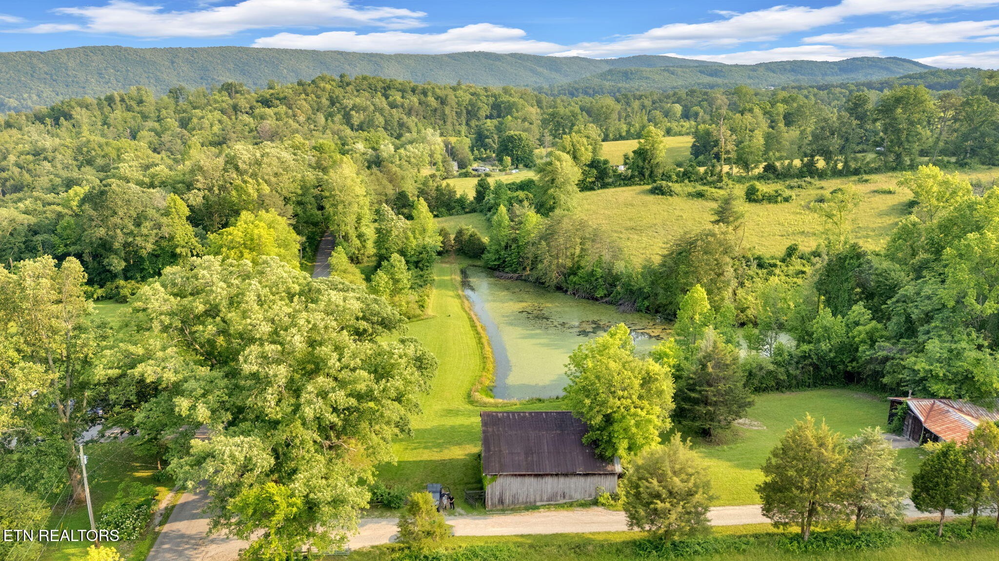 596 Clifty Creek Road Oakdale, TN 37829 - Photo 37 of 60 a view of lake view and mountain view