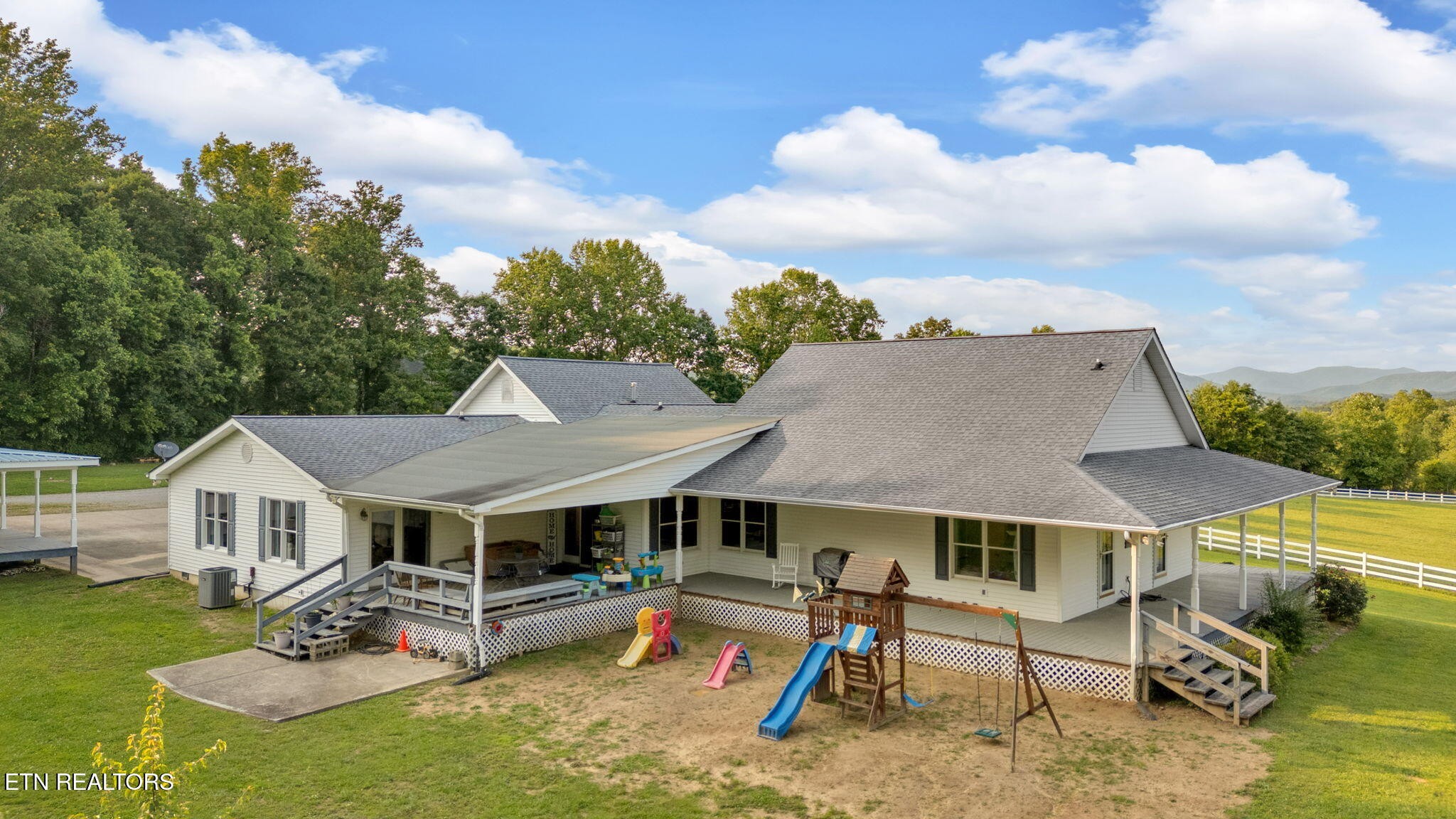 596 Clifty Creek Road Oakdale, TN 37829 - Photo 49 of 60 an aerial view of a house with swimming pool garden and patio
