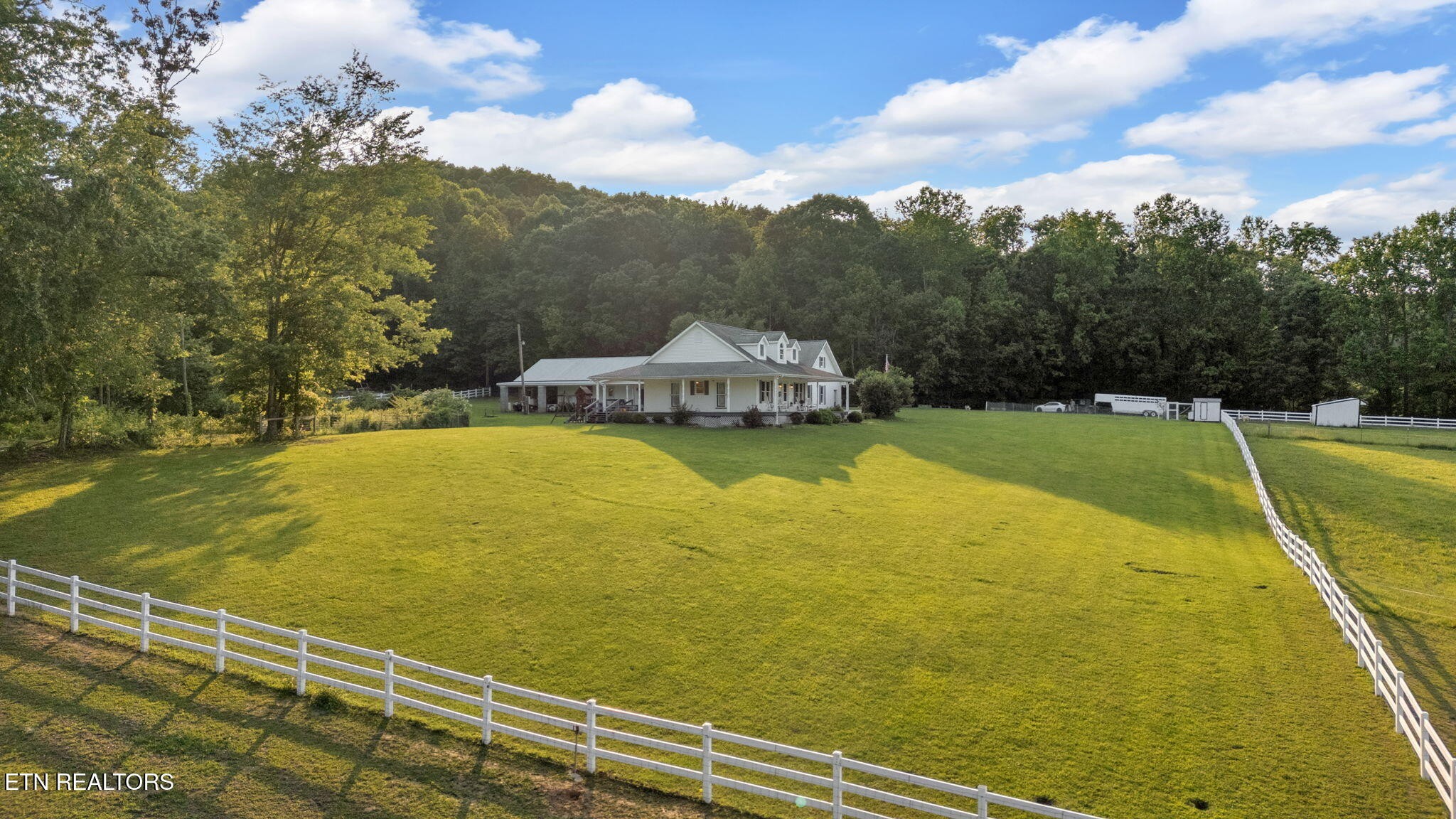 596 Clifty Creek Road Oakdale, TN 37829 - Photo 50 of 60 a view of a swimming pool with an outdoor seating
