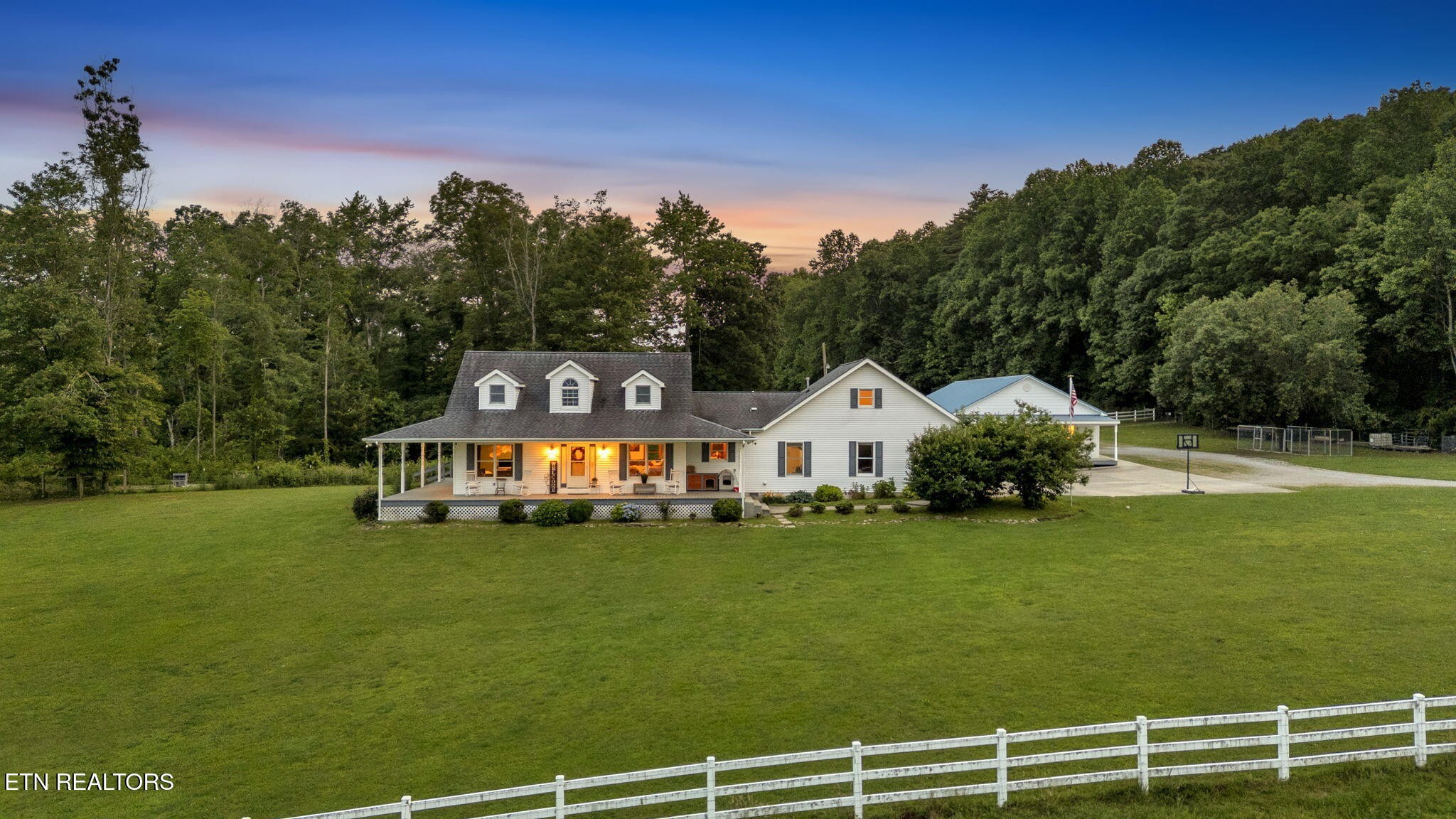 596 Clifty Creek Road Oakdale, TN 37829 - Photo 55 of 60 a front view of a house with a big yard
