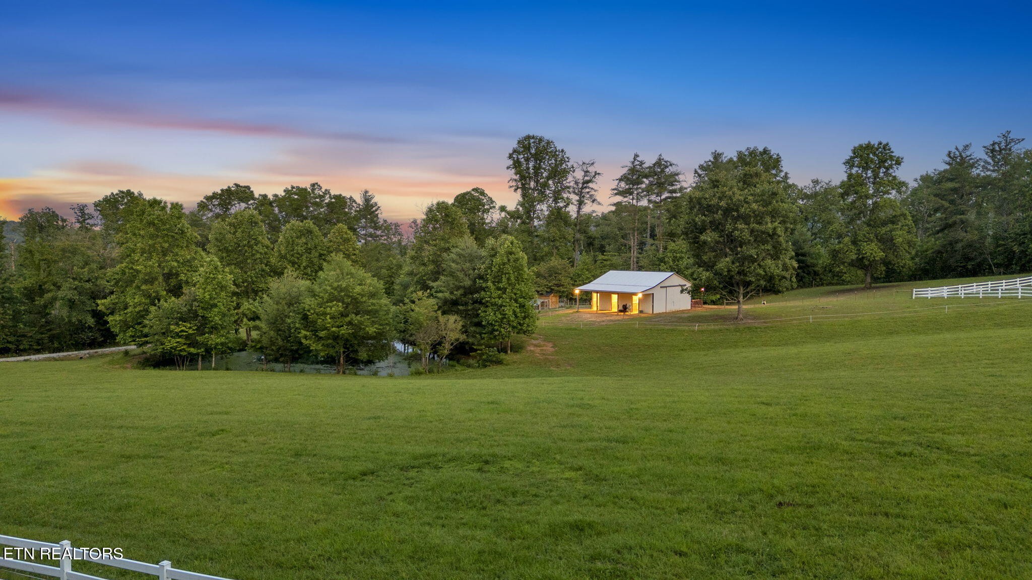 596 Clifty Creek Road Oakdale, TN 37829 - Photo 6 of 60 a front view of a house with a big yard