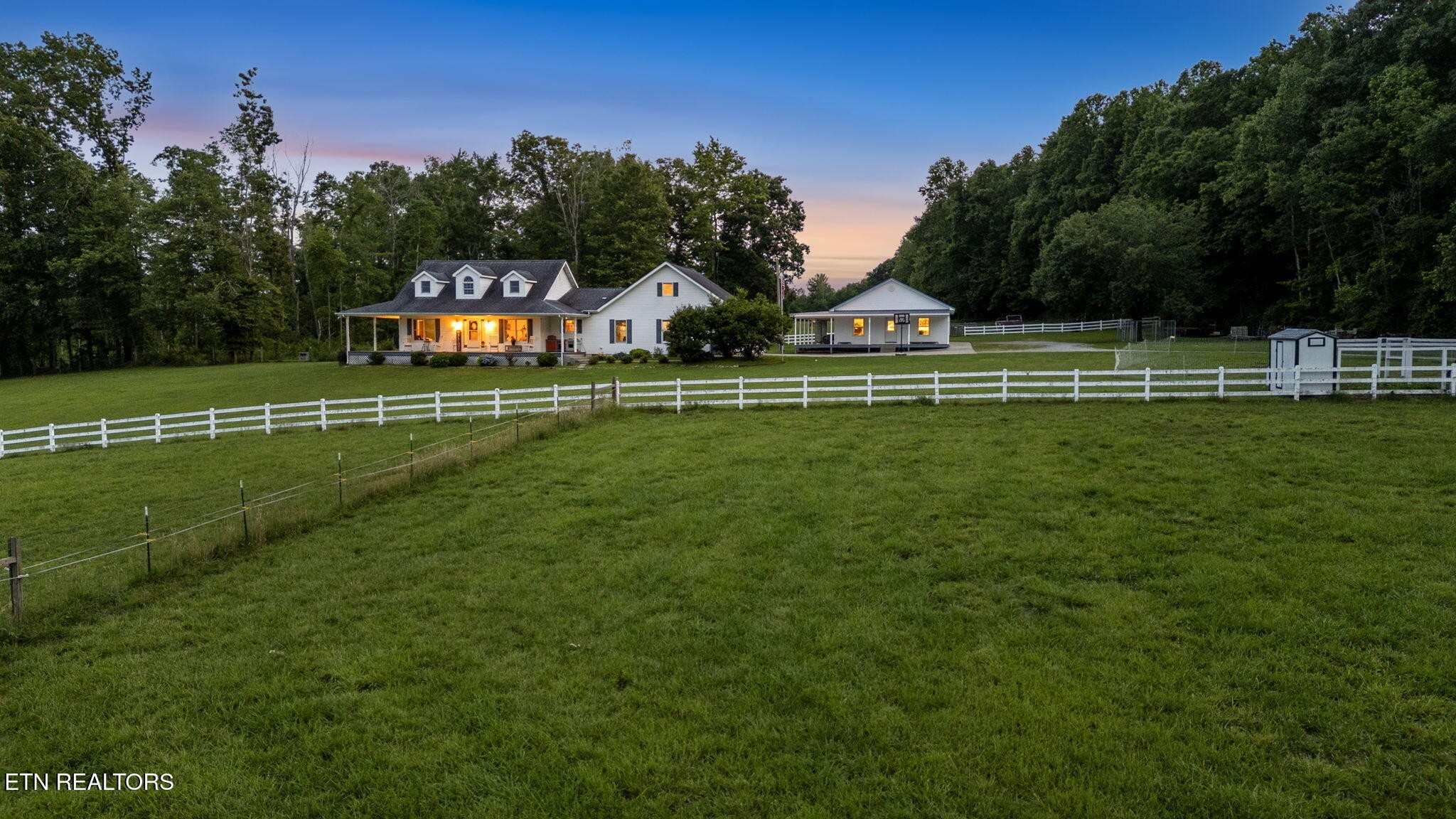 596 Clifty Creek Road Oakdale, TN 37829 - Photo 8 of 60 a front view of a house with a big yard