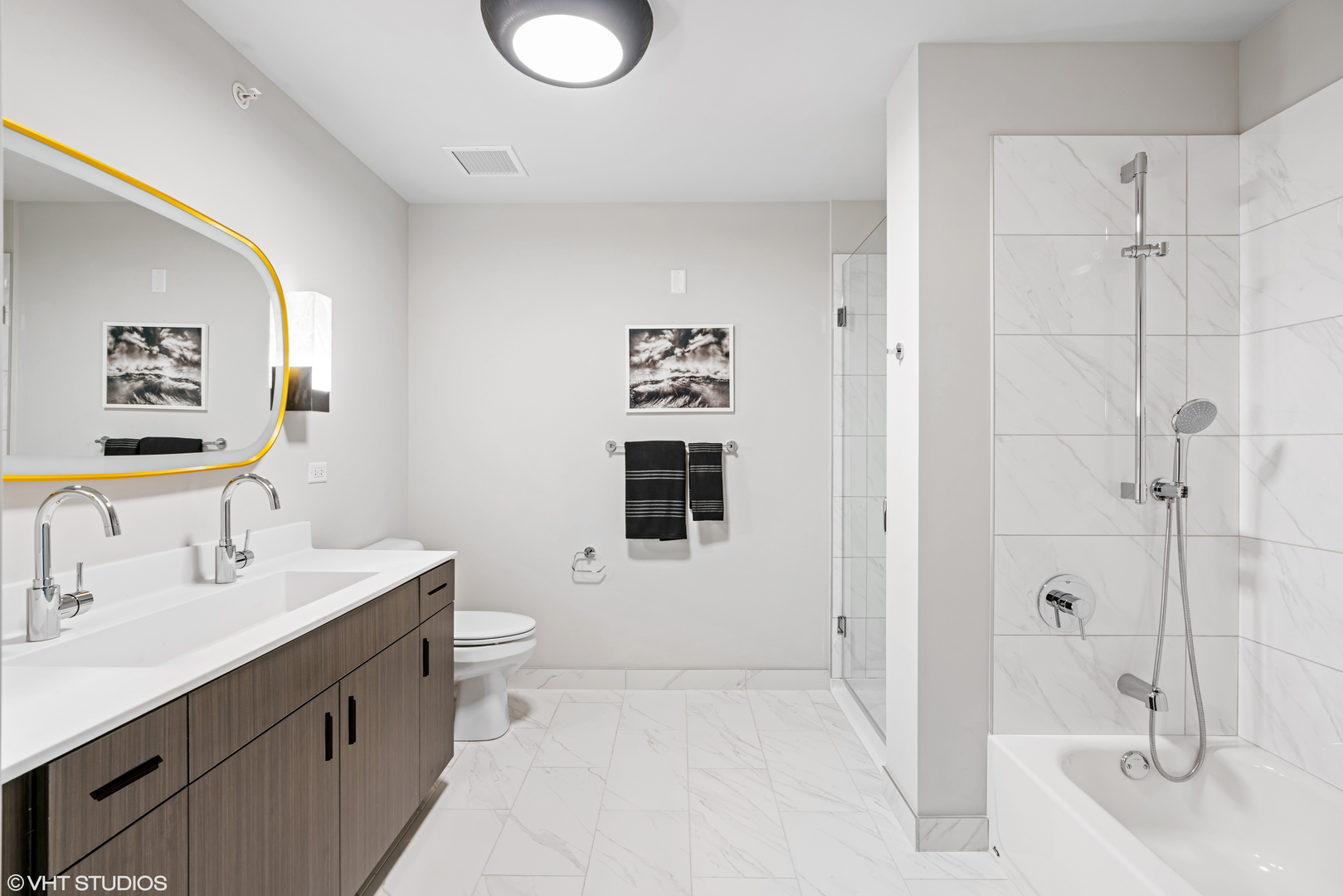 717 South Clark Street, Unit 3003 Chicago, IL 60605 - Photo 12 of 15 a bathroom with a sink a toilet and shower