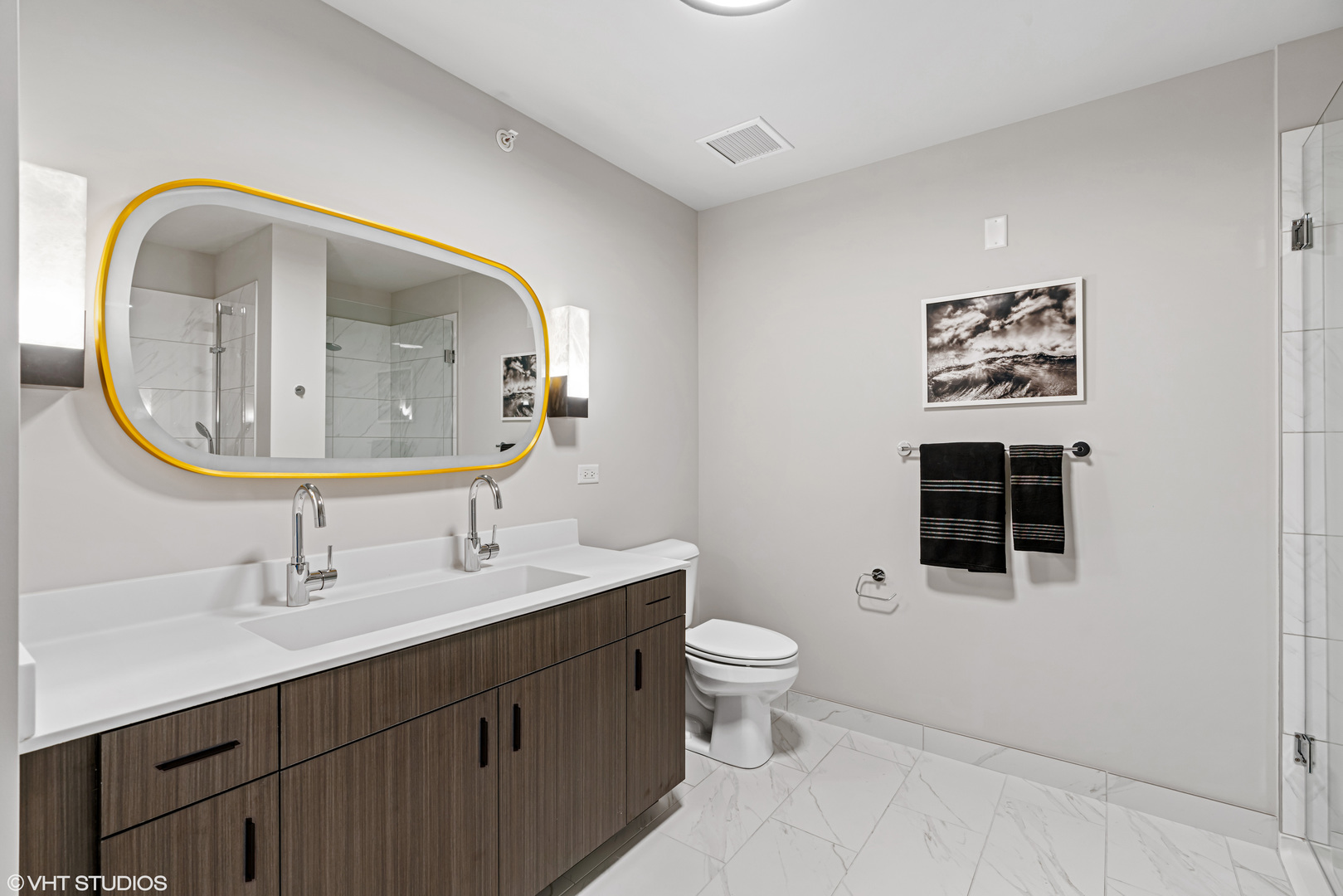 717 South Clark Street, Unit 3003 Chicago, IL 60605 - Photo 13 of 15 a bathroom with a toilet sink and mirror
