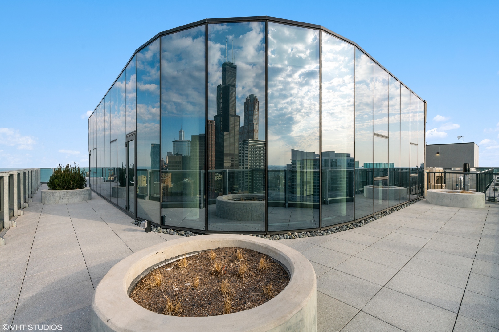 717 South Clark Street, Unit 3003 Chicago, IL 60605 - Photo 15 of 15 a view of a swimming pool with a balcony and glass door