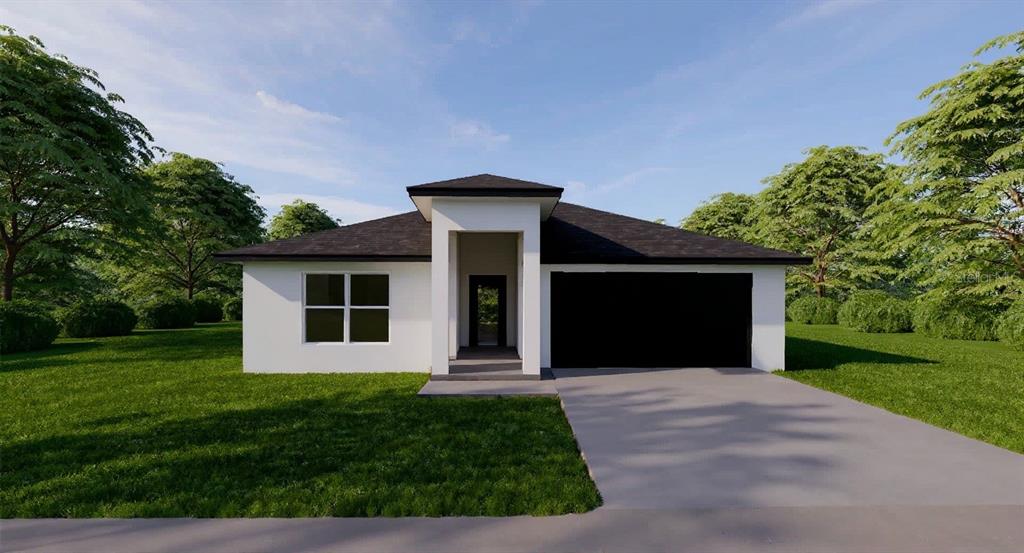 17061 Southwest 30th Avenue Road Ocala, FL 34473 - Photo 1 of 1 a front view of a house with a yard and garage