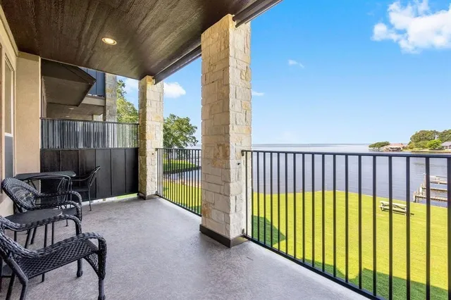 a view of balcony with furniture