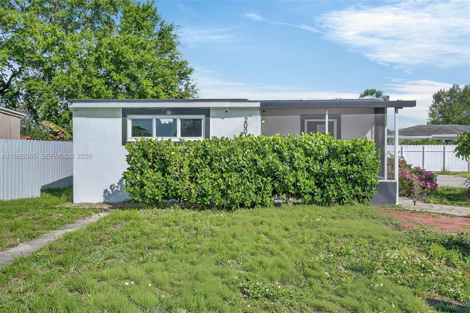 2001 Rutland Street Opa-Locka, FL 33054 - Photo 2 of 29 a view of backyard of a house