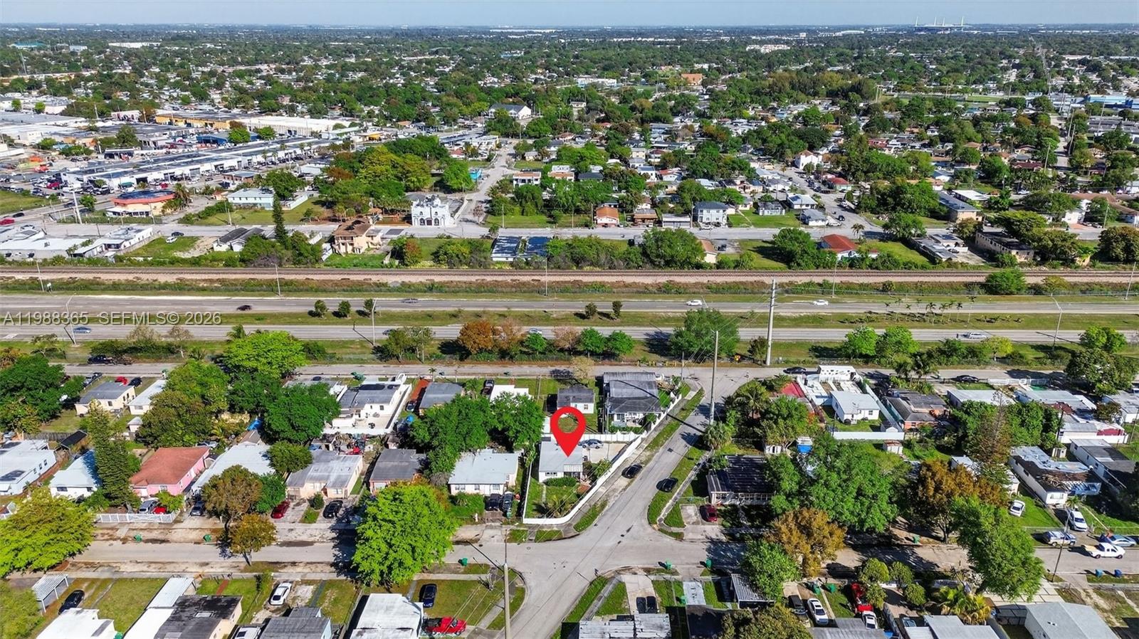 2001 Rutland Street Opa-Locka, FL 33054 - Photo 25 of 29 an aerial view of a city with lots of residential buildings