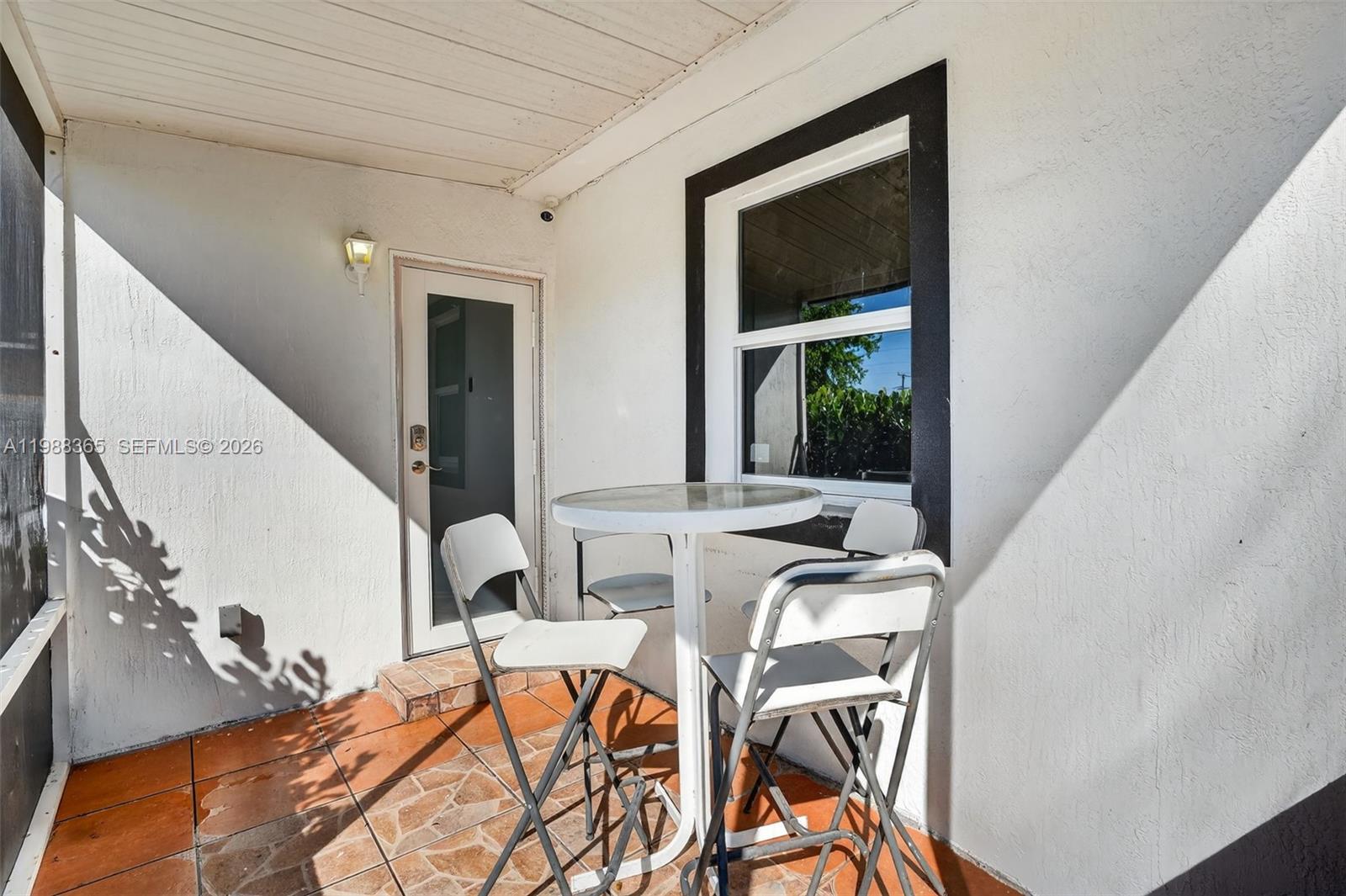 2001 Rutland Street Opa-Locka, FL 33054 - Photo 5 of 29 a view of a living room and dining room