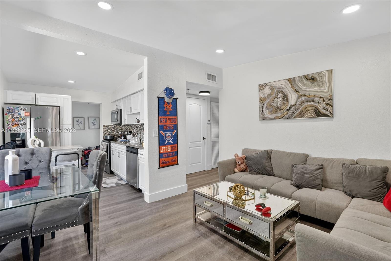 2001 Rutland Street Opa-Locka, FL 33054 - Photo 9 of 29 a living room with furniture and wooden floor