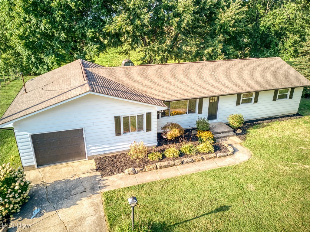 4761 Waterloo Road Atwater, OH 44201 - Photo 36 of 45 Single story home with a garage and a front yard