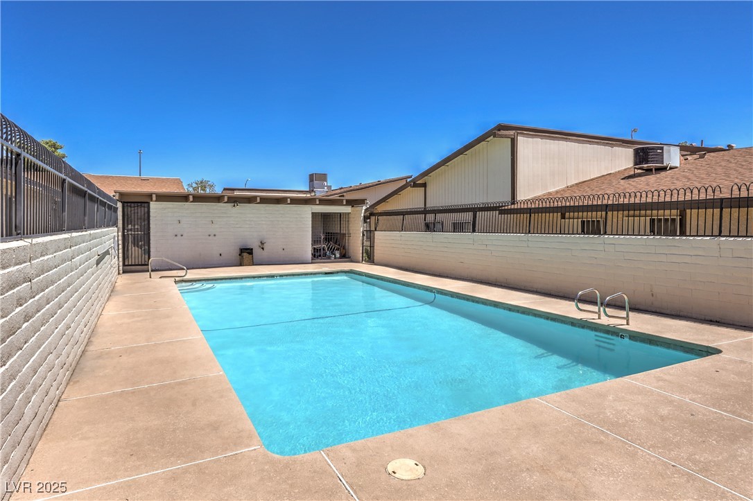 5829 Smoke Ranch Road, Unit C Las Vegas, NV 89108 - Photo 22 of 25 View of community pool