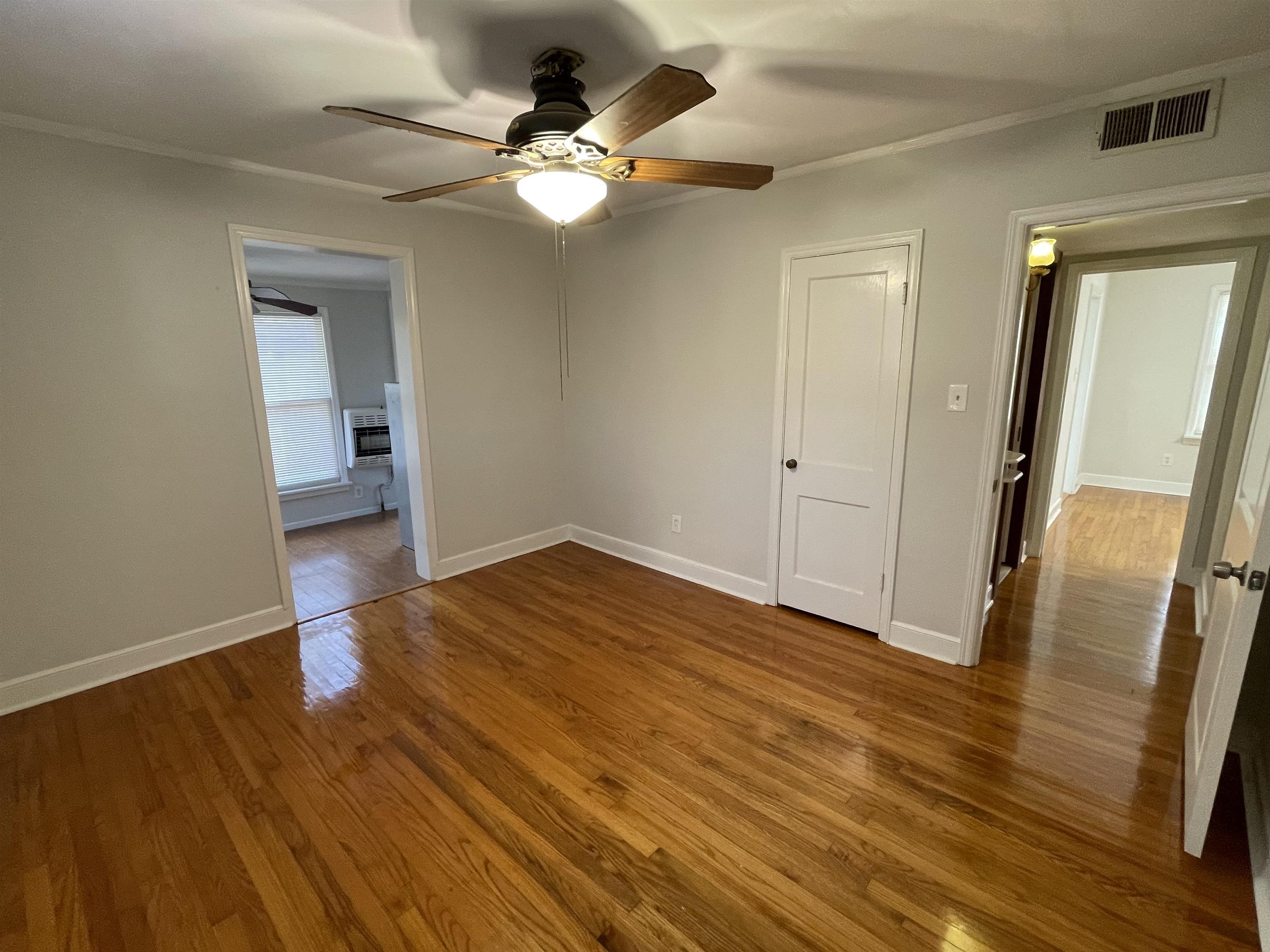 1020 Sandra Street Memphis, TN 38122 - Photo 14 of 40 wooden floor in an empty room with a mirror